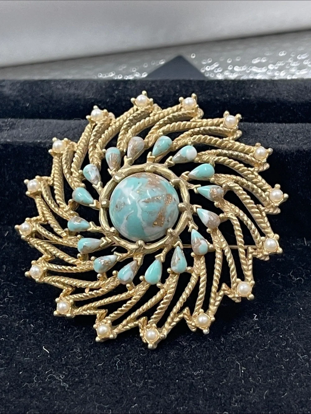 Sarah Coventry Azure Skies Pinwheel Brooch from 1973